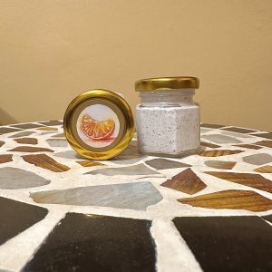 Citrus Tallow Exfoliant - image of slice of citrus on a jar.